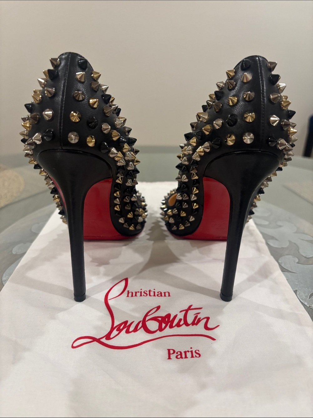 Christian Louboutin Black Studded Pumps with Red Sole